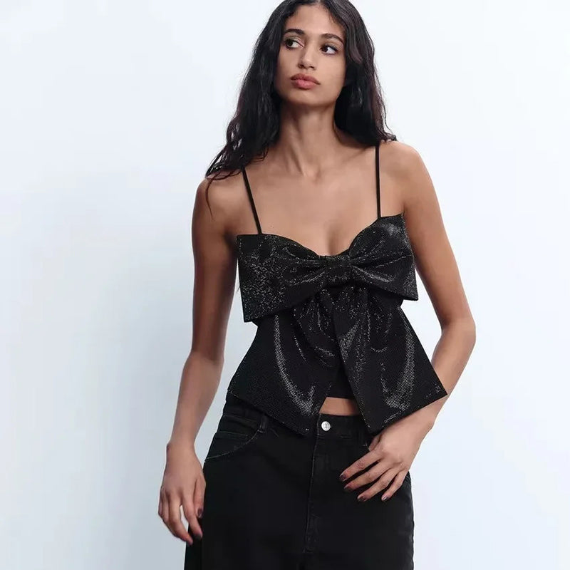 BLUSA NEGRA CON MOÑO BRILLOS