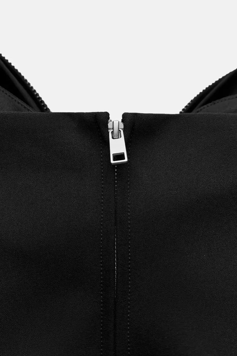 BLUSA NEGRA CON MOÑO BRILLOS
