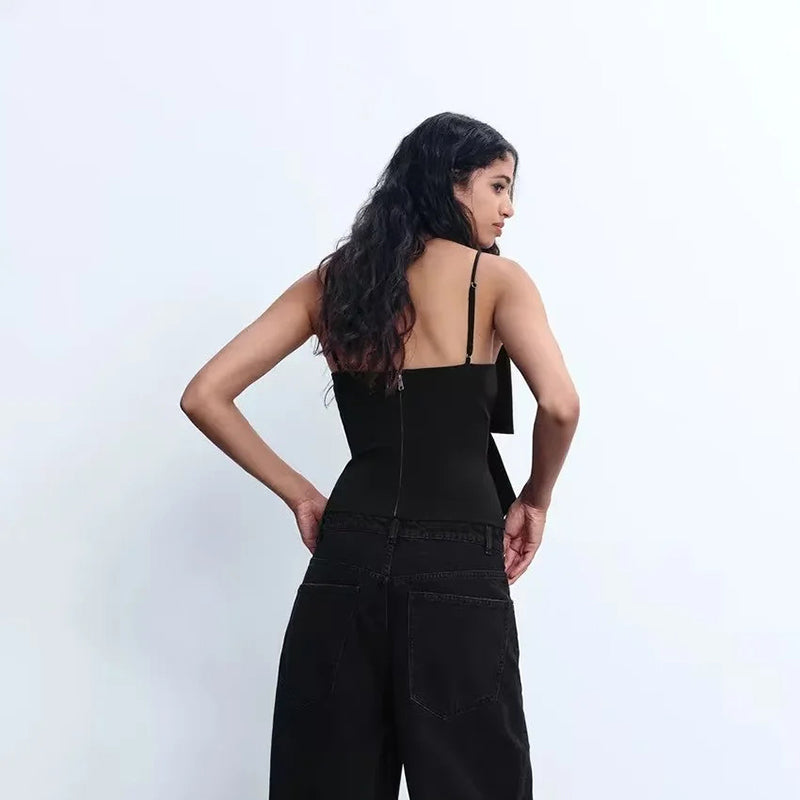 BLUSA NEGRA CON MOÑO BRILLOS
