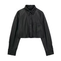 CAMISA EFECTO PIEL NEGRO CON BOLSA