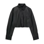 CAMISA EFECTO PIEL NEGRO CON BOLSA