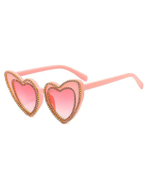 LENTE ROSA CORAZON CON PIEDRAS